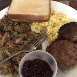 Ms D's Southern Cuisine - Two meats, eggs, hash browns and toast for under $5.