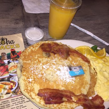 Stacks Pancake House - Visit 2: Mac'Nut Banana Pancake with scrambled eggs and bacon, and Orange Juice. Lets not forget special coconut syrup. - Breakfast & Brunch Near Me - Mission Viejo, California Stacks Pancake House - Visit 2: Mac'Nut Banana Pancake with scrambled eggs and bacon, and Orange Juice. Lets not forget special coconut syrup. - Breakfast & Brunch Near Me - Mission Viejo, California