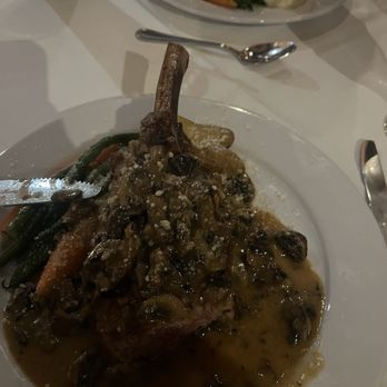 Asti Ristorante - Veal Chop Giardino covered with porcini mushrooms. - Italian Near Me - San Diego, California Asti Ristorante - Veal Chop Giardino covered with porcini mushrooms. - Italian Near Me - San Diego, California
