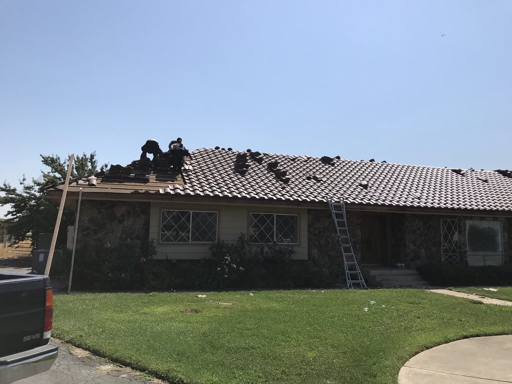 Slide of Premiere Roofing