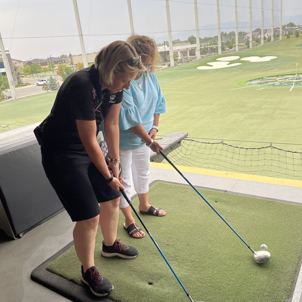Topgolf - Cluckers showing us how to swing a club! - Sports Bars Near Me - Midvale, Utah Topgolf - Cluckers showing us how to swing a club! - Sports Bars Near Me - Midvale, Utah
