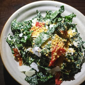 Siena Tavern - TUSCAN KALE CAESAR* Oven-dried tomato, parmesan breadcrumbs, lemon caesar dressing - Italian Near Me - Chicago, Illinois Siena Tavern - TUSCAN KALE CAESAR* Oven-dried tomato, parmesan breadcrumbs, lemon caesar dressing - Italian Near Me - Chicago, Illinois