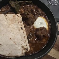 2 Taps Winebar - Harissa Lamb Tagine Slow cooked with spiced yogurt & flatbread £12