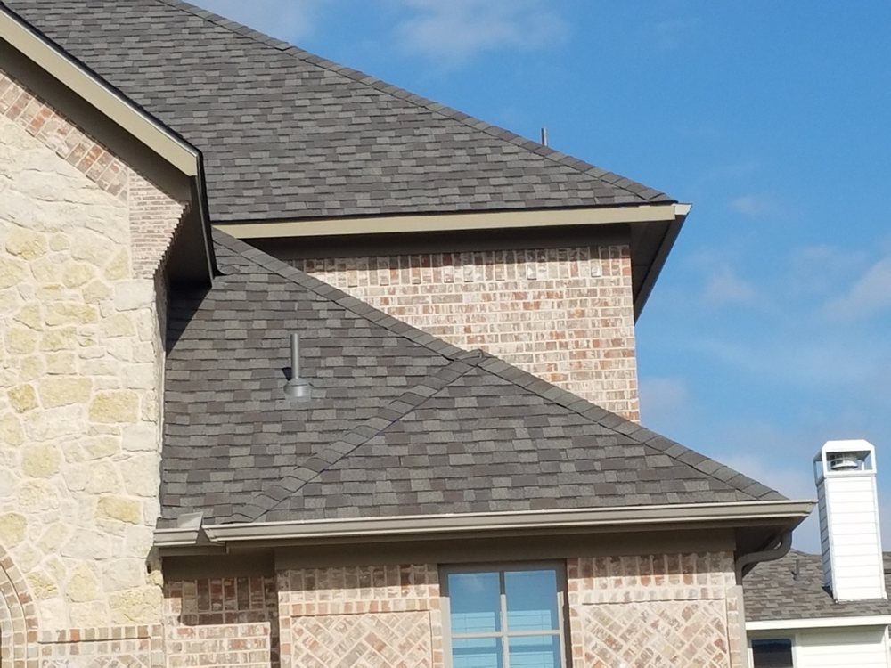 Slide of Revival Roofing