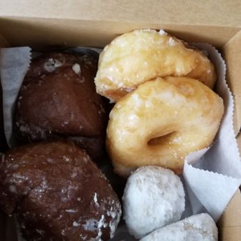 Photo of Kamehameha Bakery - Honolulu, HI, United States. Poi and glazed donuts Snowball cookies