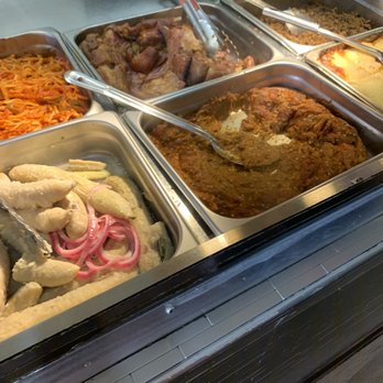 Mena - a variety of food items in a buffet - Breakfast & Brunch Near Me - Perth Amboy, New Jersey