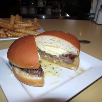 Solly's Grille - A double Solly Burger, served as pure as possible. Beef, butter, bun. Â No cheese or onions. Â As good as it gets! - Burgers Near Me - Glendale, Wisconsin Solly's Grille - A double Solly Burger, served as pure as possible. Beef, butter, bun. Â No cheese or onions. Â As good as it gets! - Burgers Near Me - Glendale, Wisconsin