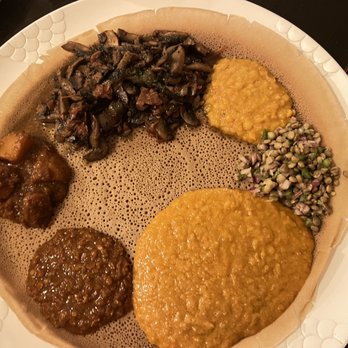 Mesobrestaurant.Com - Portobello and Shiro main with sides - Ethiopian Near Me - Montclair, New Jersey