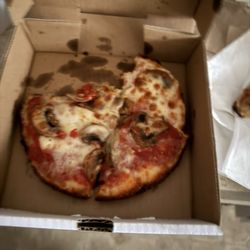 Vernie's Pizza - Individual mushroom pizza. Excellent flavor the crust perfect