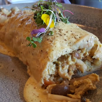 OEB Breakfast - Bridgeland - Cut open crepe. Cream covered inside, cream covered outside. - Breakfast & Brunch Near Me - Calgary, Alberta