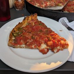 Pizano's Pizza and Pasta - A slice of Rudy's Special (Sausage, Mushroom, Onion, Green Pepper)