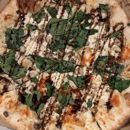 White Garlic Pizza (half with hot sauce added) White Garlic Pizza (half with hot sauce added)