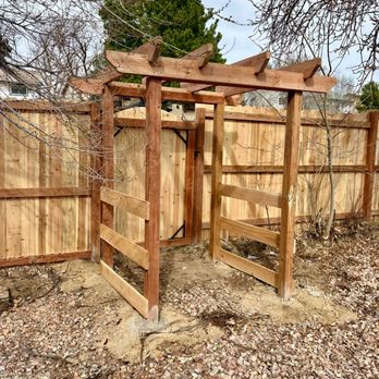 Justin Cooper Construction - Beautiful custom built pergola archway with standard cedar privacy fence built. - Decks & Railing Near Me Justin Cooper Construction - Beautiful custom built pergola archway with standard cedar privacy fence built. - Decks & Railing Near Me