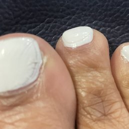 The polish was so thick, that when the top coat was applied it crinkled. The top coat was only on half the nail. The polish was so thick, that when the top coat was applied it crinkled. The top coat was only on half the nail.