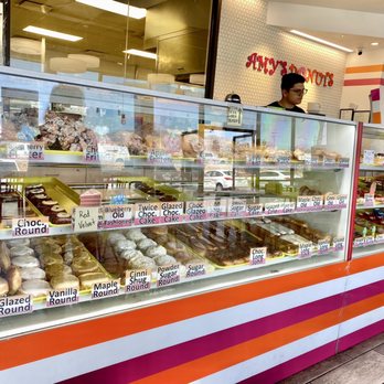 Amy's Donuts - The bakery showcase stretched across the full length of the shop full of yumminess. - Donuts Near Me - Albuquerque, New Mexico