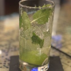 House Mojito: Bacardi Limón, fresh lime & fresh, muddled mint... various flavors available....