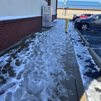 CVS Pharmacy - snow on the sidewalk in front of a building - Drugstores Near Me - Saint Louis, Missouri