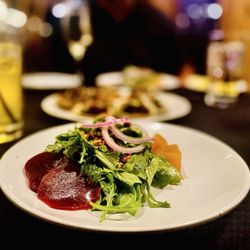 Prime 88 Steakhouse - Red/Yellow Beet & arugula salads w/whipped rocotta cheese & pecans. Oysters Rockefeller in middle. Both sensational OuiOui.