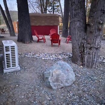 AB's Landscape - a red cabin and a red chair - Landscaping Near Me - Portola, California