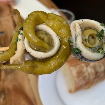 The Harvest Vine - GILDA - vinegar cured anchovy skewer with pippara peppers & anchovy stuffed olives - Tapas Bars Near Me - Seattle, Washington The Harvest Vine - GILDA - vinegar cured anchovy skewer with pippara peppers & anchovy stuffed olives - Tapas Bars Near Me - Seattle, Washington