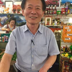 Country Produce - Mr. Kim from Country Produce inside The Sweet Auburn Curb Market. :)