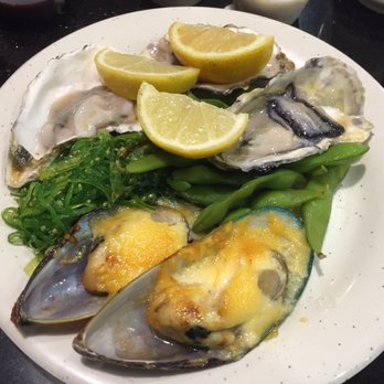 Tian Tian Buffet - a plate of oysters, asparagus, and broccoli - Buffets Near Me - Dinuba, California