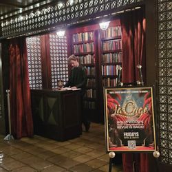Cinegrill Theater - Announce yourself and pass through Secret book case door
