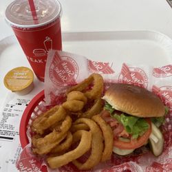 Steak ’n Shake - Single patty Bacon cheese burger & onion rings...$12.06
