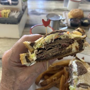 The Rooster - Delicious Texas Ruben brisket on soft marble rye - American Near Me - Naples, Florida