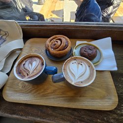 Shakespeare and Company - Left - Mocha Latte  Right - Chocolate Chaud Cinnamon roll and Chocolate rye cookie amazing.