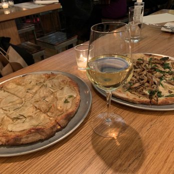 Double Zero - Left: Potato Pizza, Right: Truffle Cashew Cream - Pizza Near Me - New York, New York Double Zero - Left: Potato Pizza, Right: Truffle Cashew Cream - Pizza Near Me - New York, New York