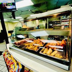 On the Go - Hot deli & fried chicken inside..