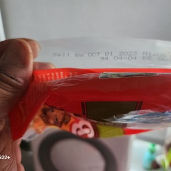 CVS Pharmacy - a hand holding a red scissors - Drugstores Near Me - Fort Lauderdale, Florida