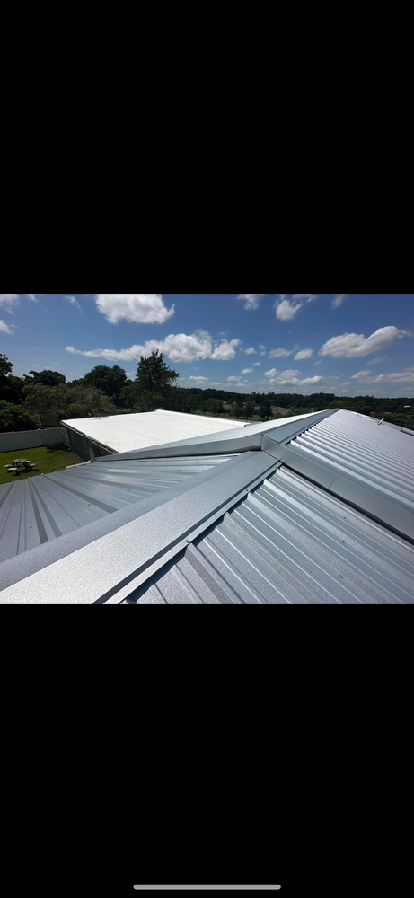 Slide of Capstone Roofing