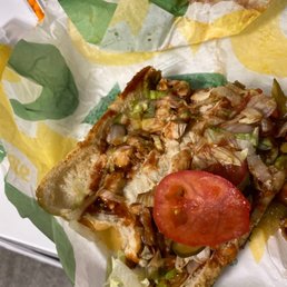 a close up of a piece of pizza