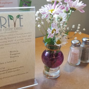 Thrive Diner - Table settings with fresh flowers and Himalayan sea salt in the shaker, nice touch! - Vegan Near Me - Pittsfield, Massachusetts
