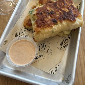 Win Son Bakery - Egg + Cheese Scallion Pancake - Bakeries Near Me - New York, New York Win Son Bakery - Egg + Cheese Scallion Pancake - Bakeries Near Me - New York, New York