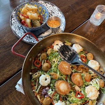 Pulpo Kitchen + Lounge - Seafood paella, yucca frites - Salad Near Me - St. Petersburg, Florida Pulpo Kitchen + Lounge - Seafood paella, yucca frites - Salad Near Me - St. Petersburg, Florida