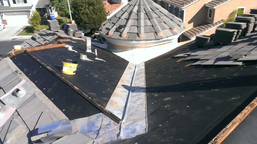 Slide of Sutton Roofing and Solar