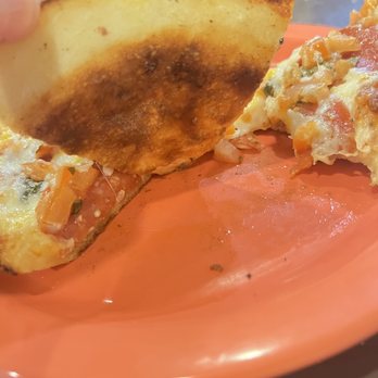 Growler’s Pizza Grill - Undercarriage of my pizza. - Pizza Near Me - Donnelly, Idaho