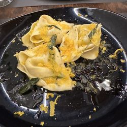 La Salmoneria - TORTELLI AL BACCALA Fresh artisanal egg tortelli filled with cod and ricotta, in butter and sage emulsion, with a rain of bottarga
