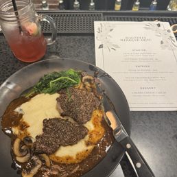 Steak Au Poivre and a bless your heart cocktail. Absolutely delicious. Love this place. Steak Au Poivre and a bless your heart cocktail. Absolutely delicious. Love this place.
