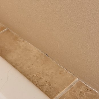 South Hill Construction - Hole in wall on the tub side. - Drywall Installation & Repair Near Me - Roy, Washington