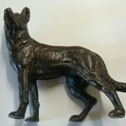 C&C Antique & Resale Emporium - This is a 1920s Rin Tin Tin cast iron dog that use as a door holder.
