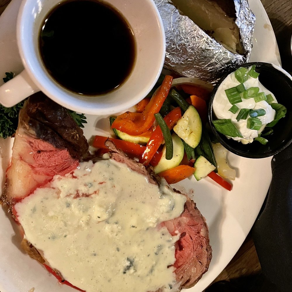 Ye Olde Lamplighter - Prime rib w/ gorgonzola cheese - Steakhouses Near Me - San Bernardino, California Ye Olde Lamplighter - Prime rib w/ gorgonzola cheese - Steakhouses Near Me - San Bernardino, California