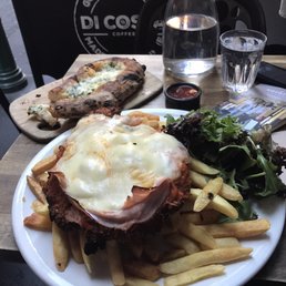 This is the massive chicken parmigiana topped with ham and a side of cheesy garlic bread. Easily 2-3 meals on one plate. This is the massive chicken parmigiana topped with ham and a side of cheesy garlic bread. Easily 2-3 meals on one plate.