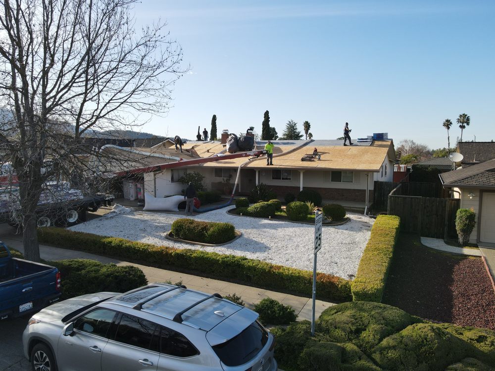 Slide of ELM Roofing Contractors