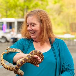 Creature Comforts Veterinary Service - She says it's just another day at work. We say it's snake charming at its finest.