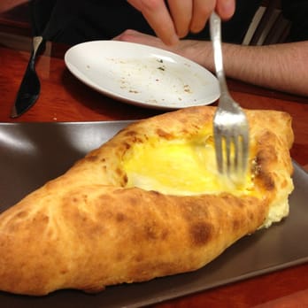 Berikoni Bakery - Mixing the butter and egg into the cheese. An amazing bread. - Bakeries Near Me - Brooklyn, New York