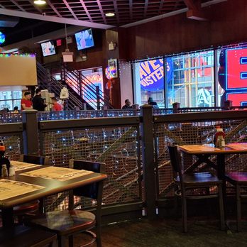 Dallas BBQ - This is the general look of the upstairs, with those big windows over 42nd St. providing a lot of natural light. - Barbeque Near Me - New York, New York Dallas BBQ - This is the general look of the upstairs, with those big windows over 42nd St. providing a lot of natural light. - Barbeque Near Me - New York, New York